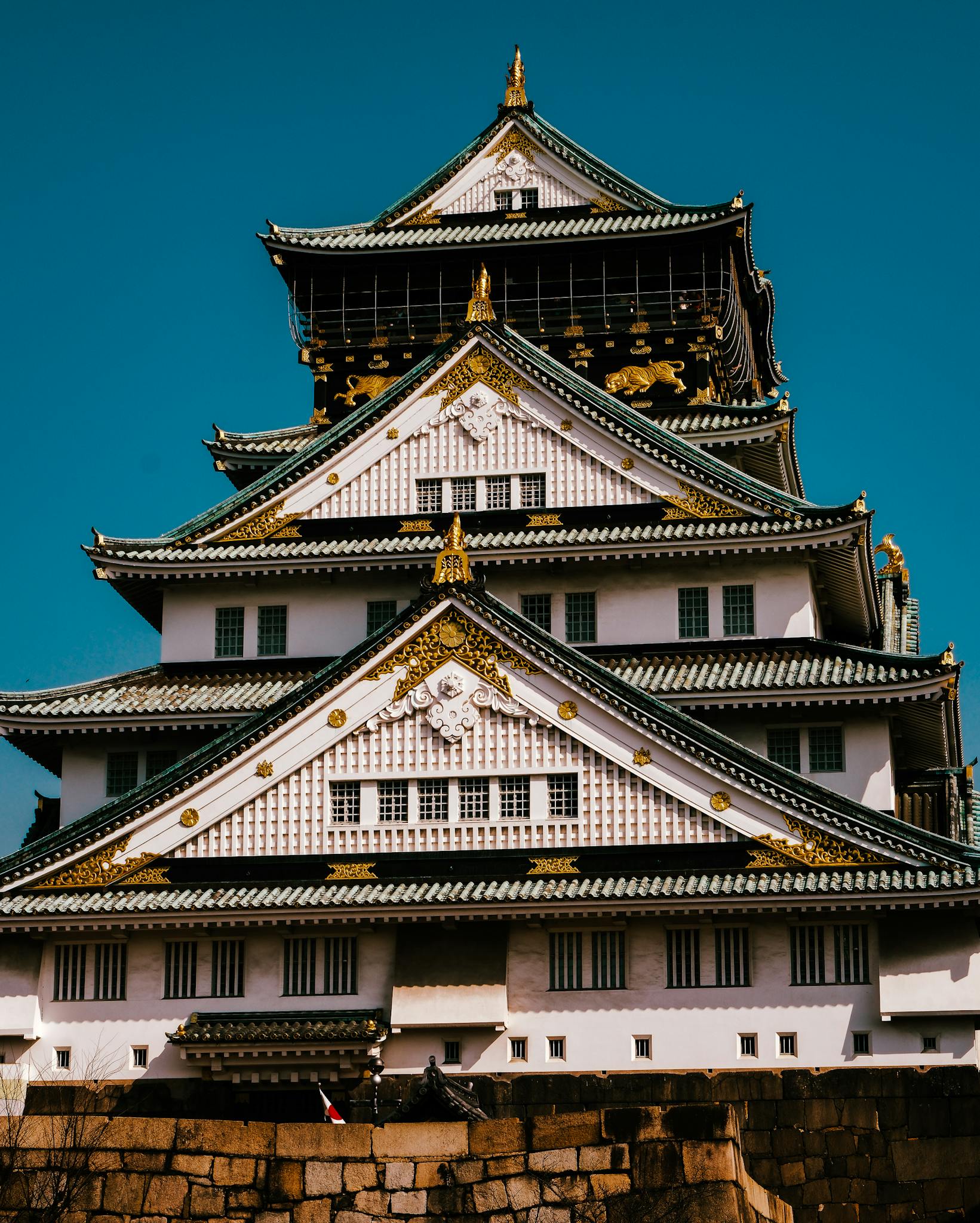 Stunning capture of the ornate Osaka Castle's architecture in Kyoto, Japan.